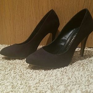 Classic black suede pumps