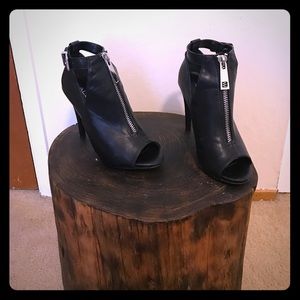 Aldo heeled booties with silver buckle