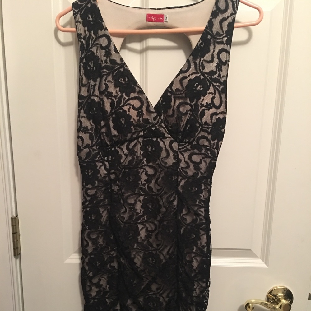Beautiful lace dress with cutout back.