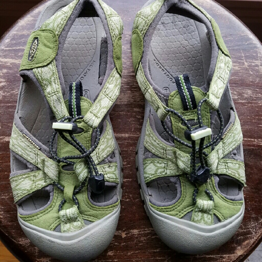 Keens!!! Keen sandals.  Very gently used.