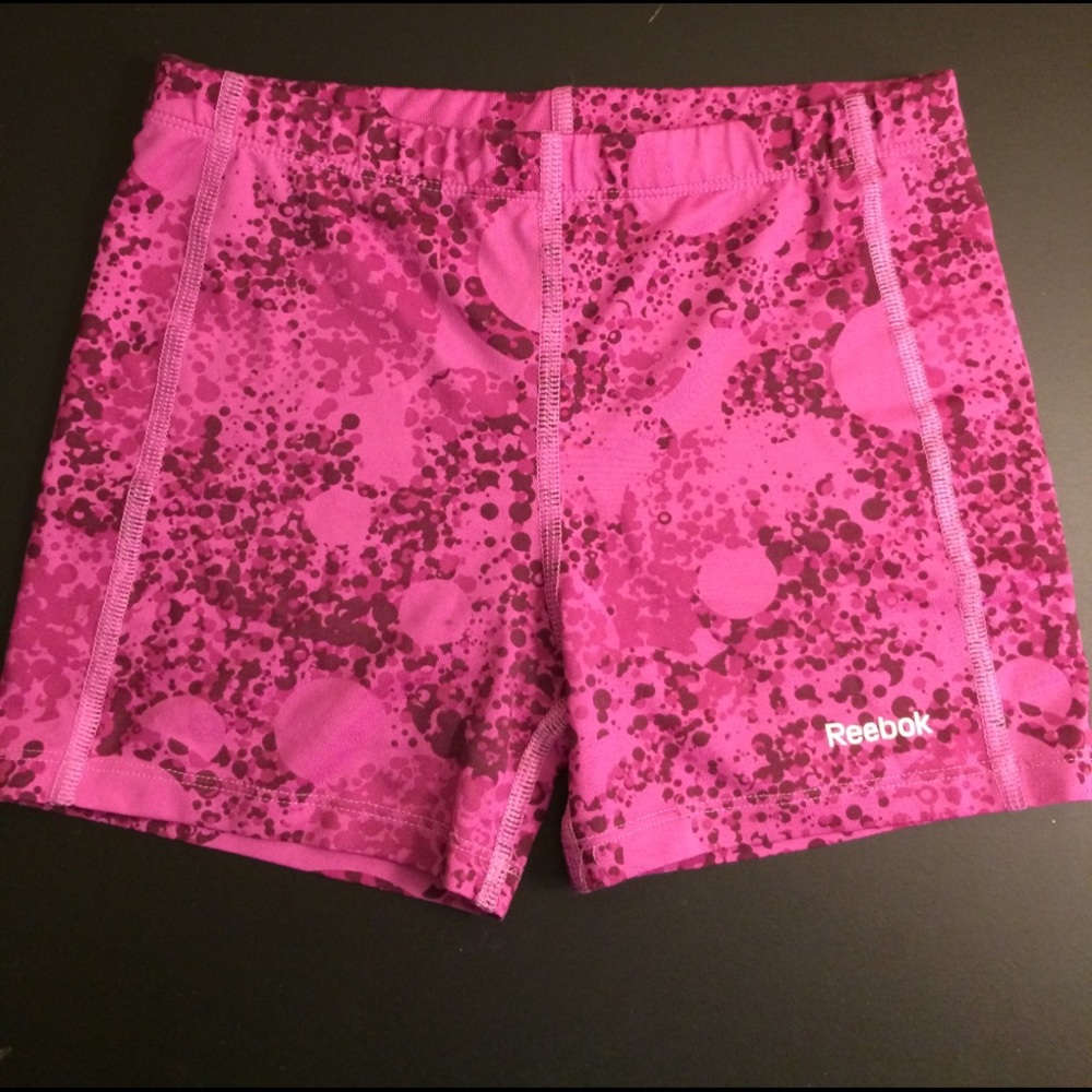 Pink splatter paint spandex workout shorts