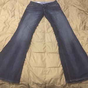 Gap 1969 Flare Jeans. Darker blue with fading.