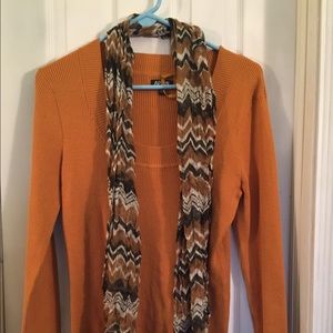 Punkin color sweater with scarf.