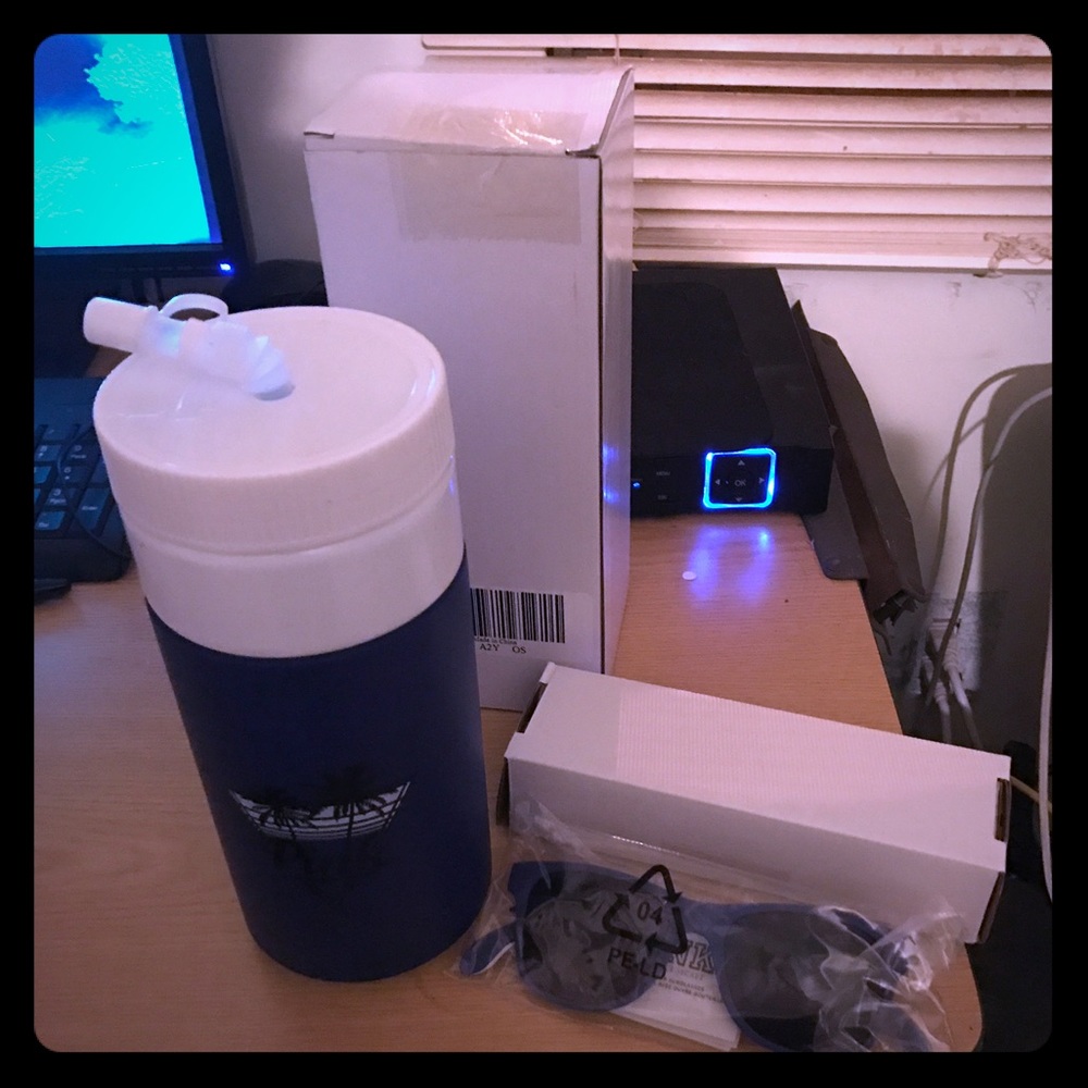 PINK water bottle and sunglasses