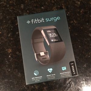 New in box FitBit Surge