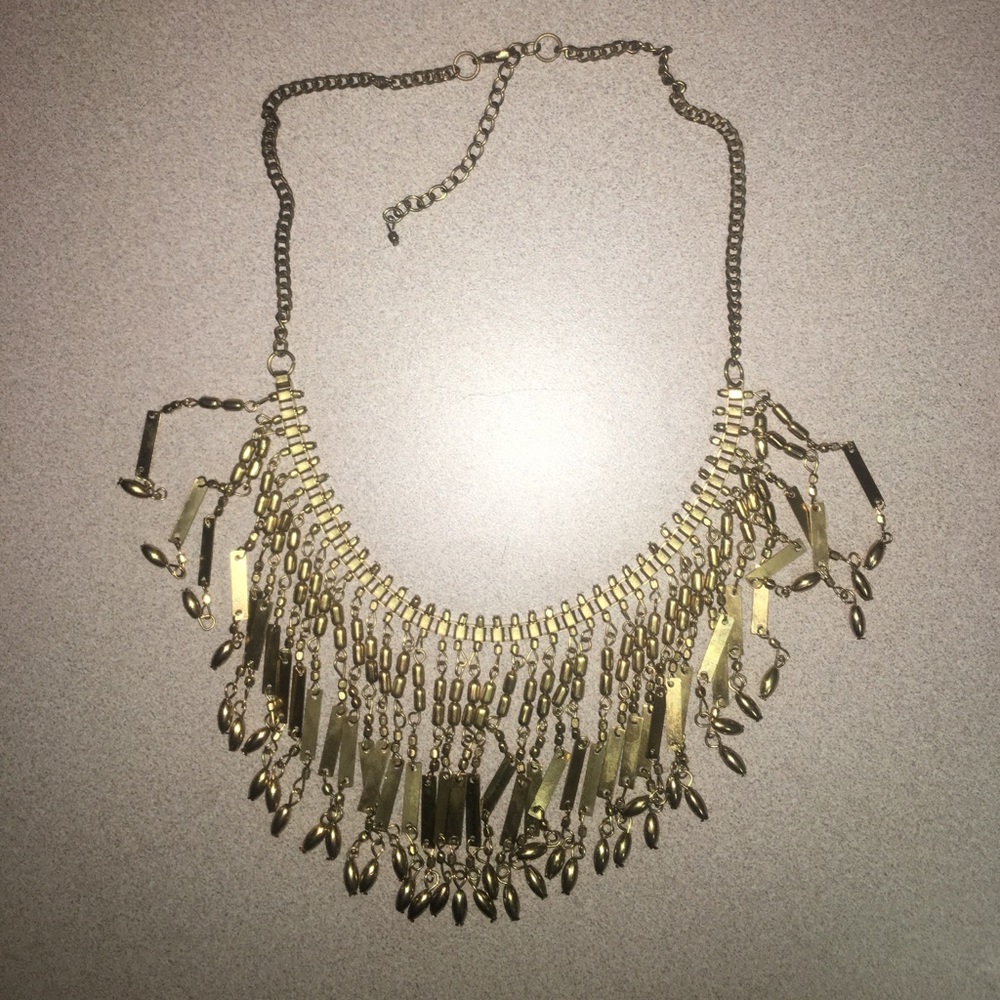 Gold statement necklace.
