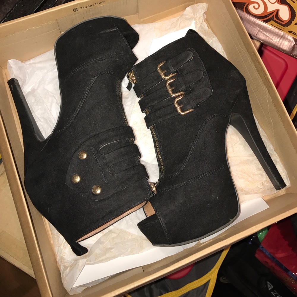 Black peep toe booties.