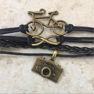 Multi string leather type charm bracelet