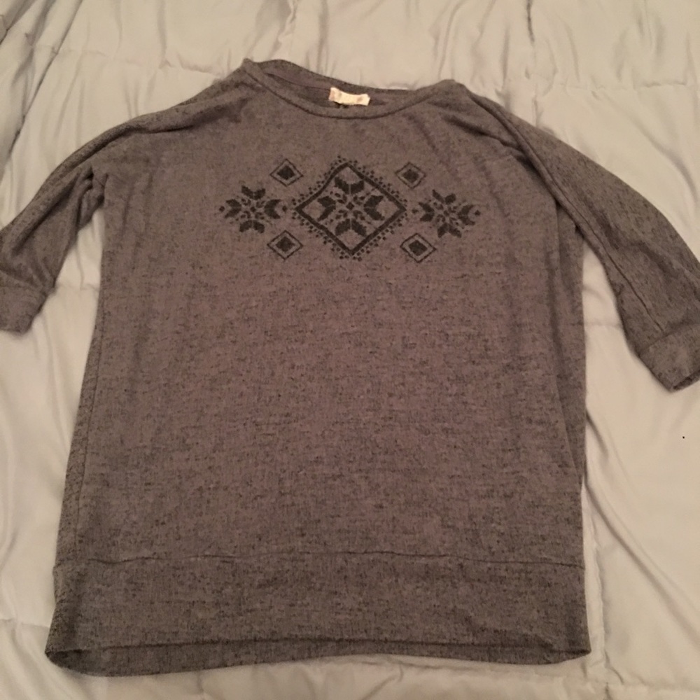 Grey sweater with black design