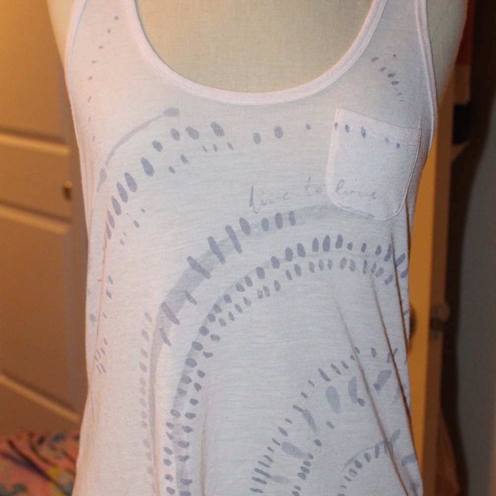 Pink tank with purple dots "live to love"