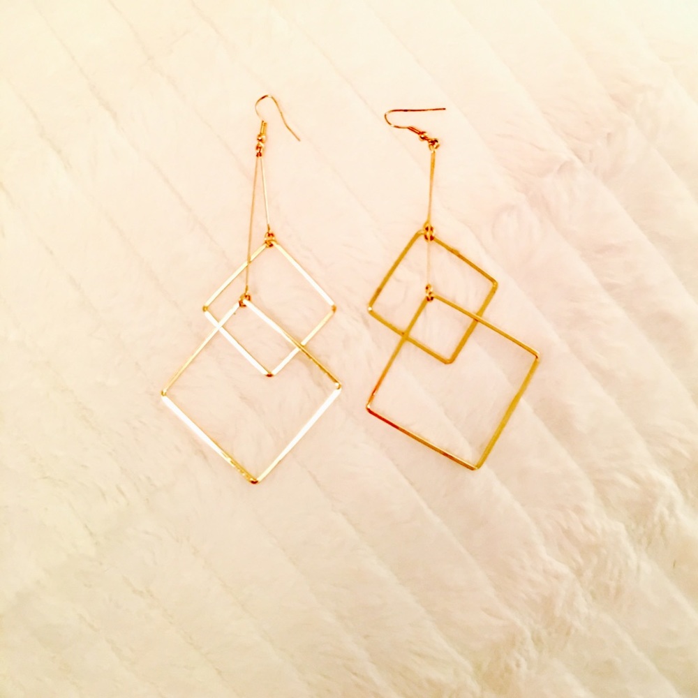 Gold tone dangle earrings