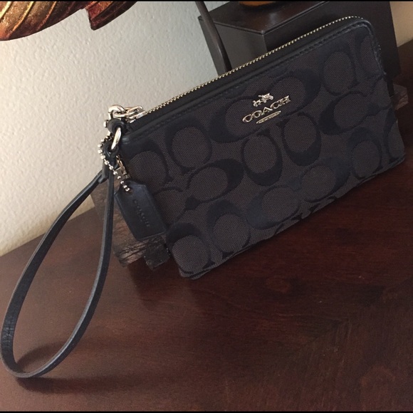 Coach Handbags - COACH Wristlet BLACK COACH 🌺last call 6 1/4"-4"