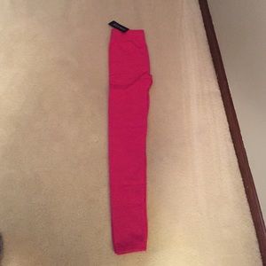 Small pink leggings.