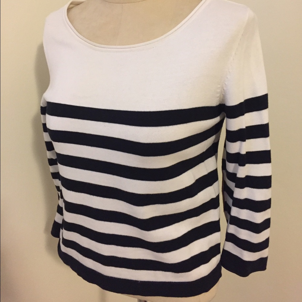Cropped stripe sweater with elbow patch detail.