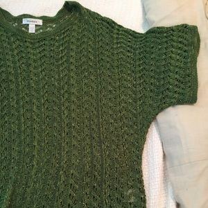 Green sweater.