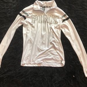A white Victoria's Secret Pink half-zip.