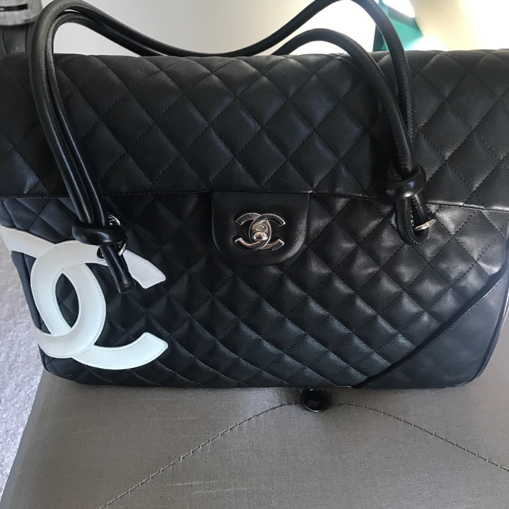 Vintage Chanel black quilted with white Logo