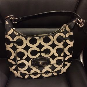 Black and beige Coach purse