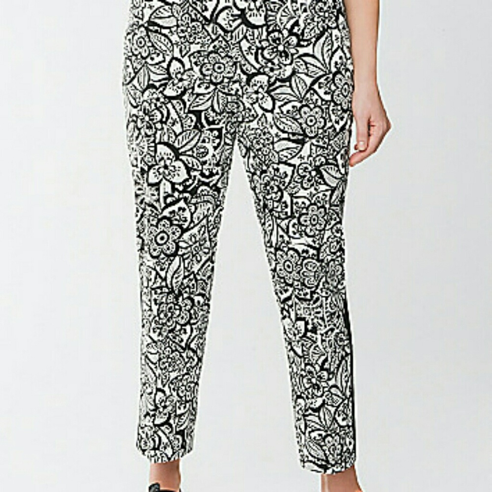 Floral print tuxedo stripe ankle pants.
