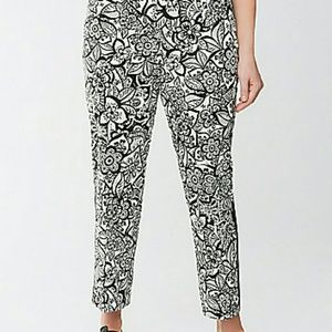 Floral print tuxedo stripe ankle pants.