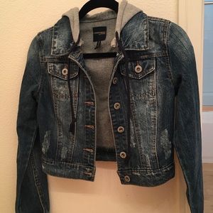 Jean jacket with sweatshirt type hood.