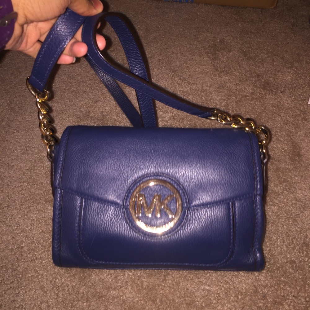 Blue Michael Kors crossbody with gold hardware