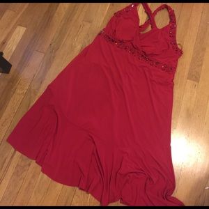 Red cocktail halter dress with embellishments.