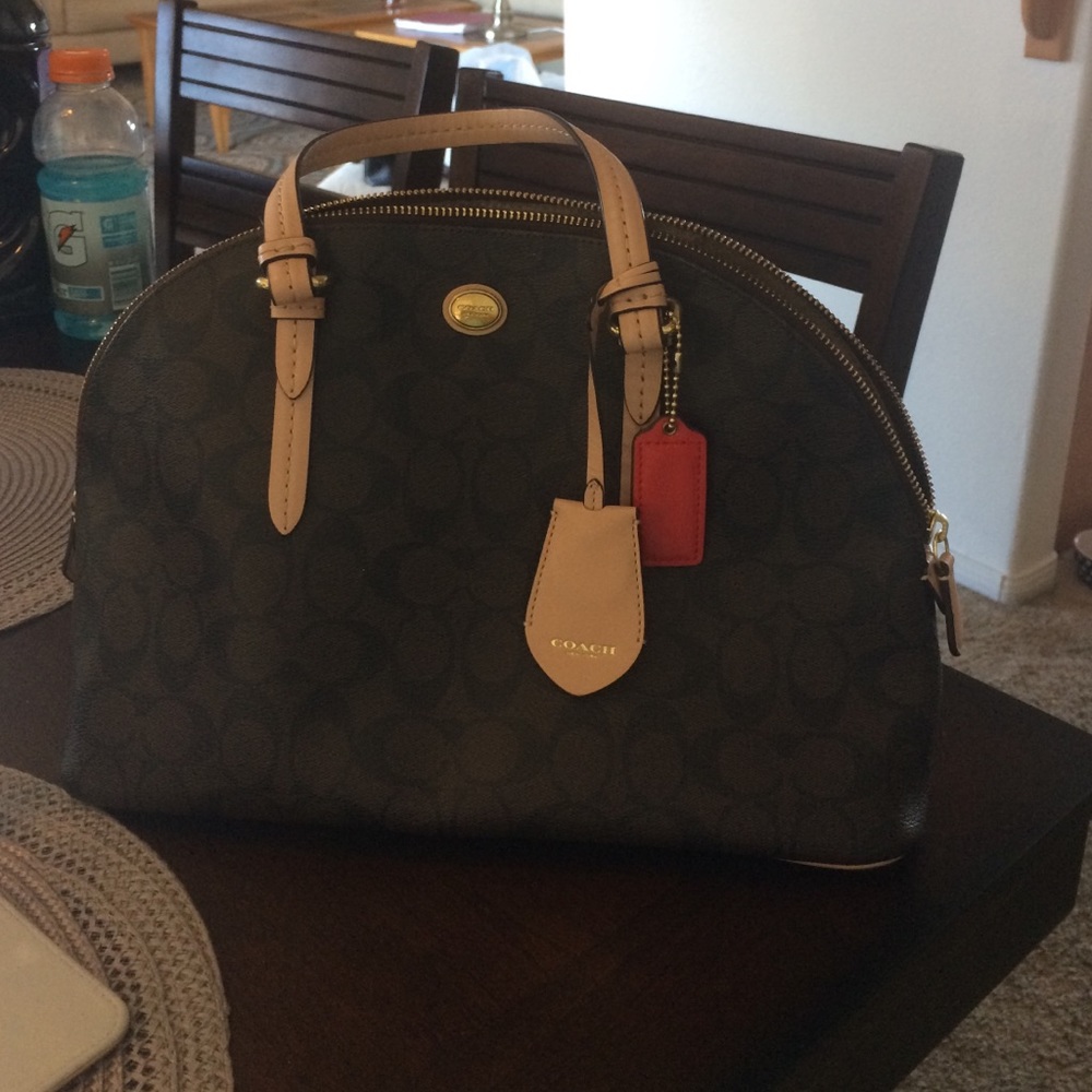 Coach purse- dark brown with nude handles.