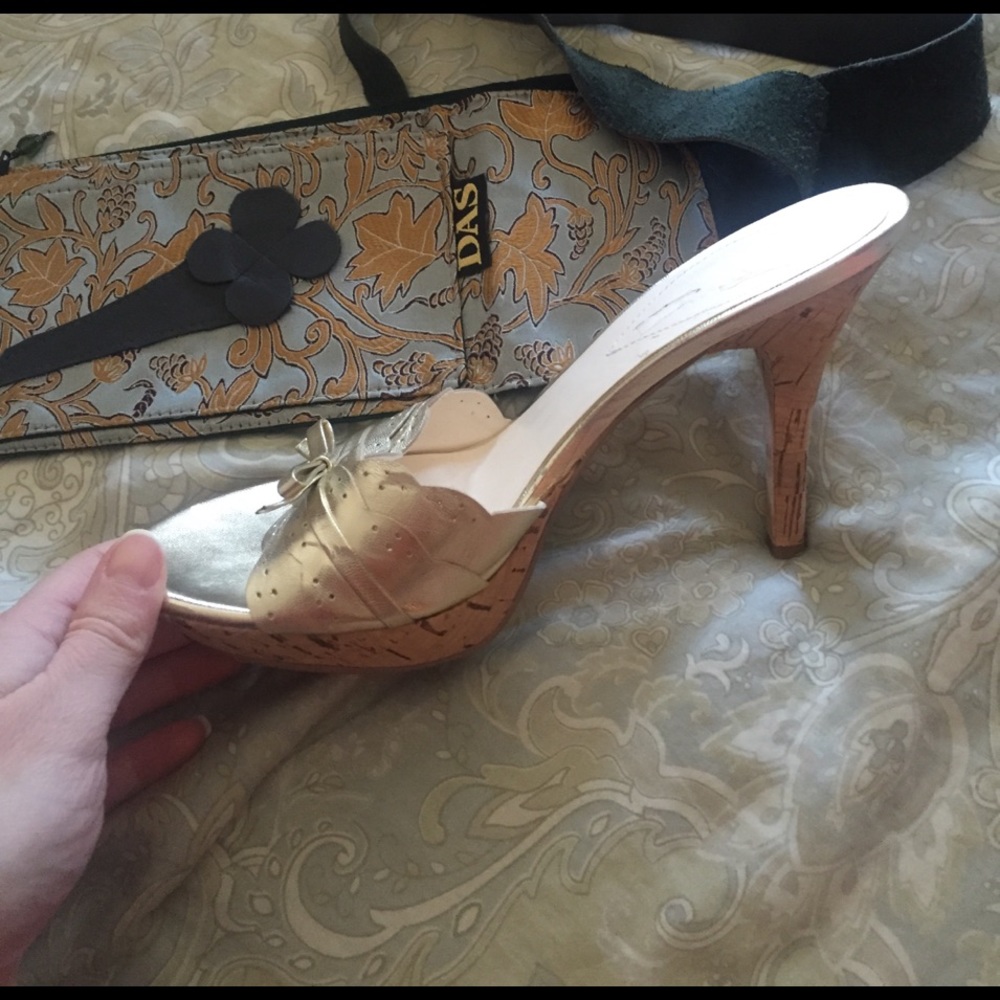Guess by Marciano gold heels. Worn only twice.