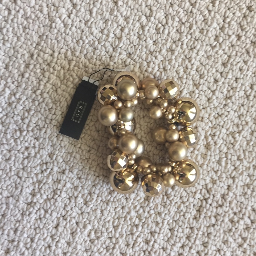 Gold beaded stretch bracelet.