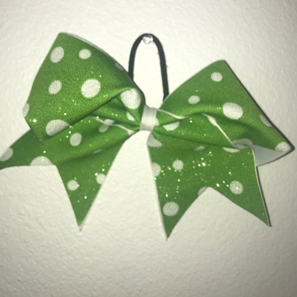 Green and white polkadot bow