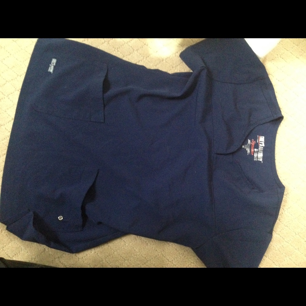 Navy blue Greys Anatomy scrubs.