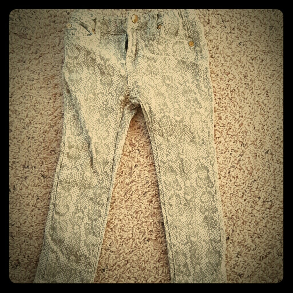 Snake print skinny jeans
