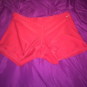 Red Nike shorts