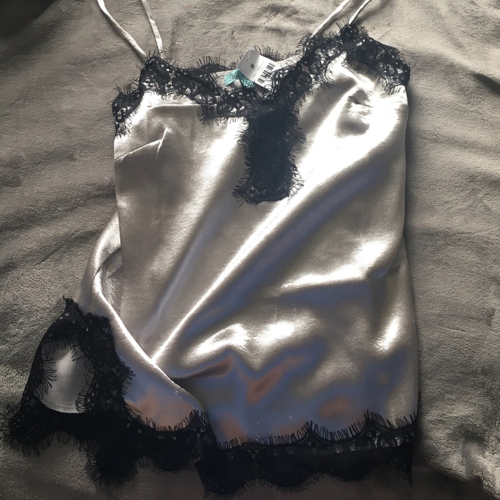 LF Shirt that is silver and brand new