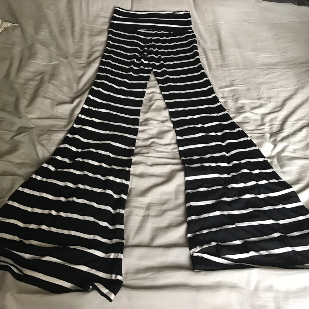 Black and white striped bell bottom pants