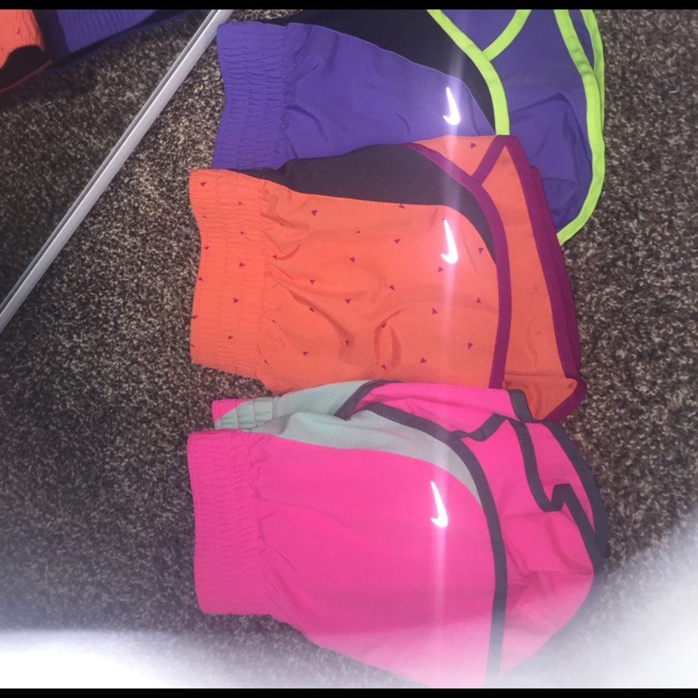 3 pairs of Nike running shorts