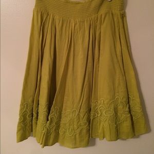 Chartreuse skirt with embroidered detail