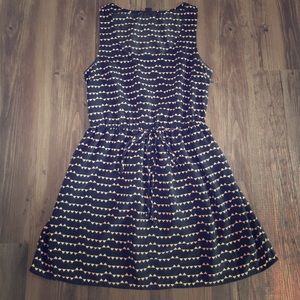 Adorable Black Dress with Light Tan/Coral Pattern