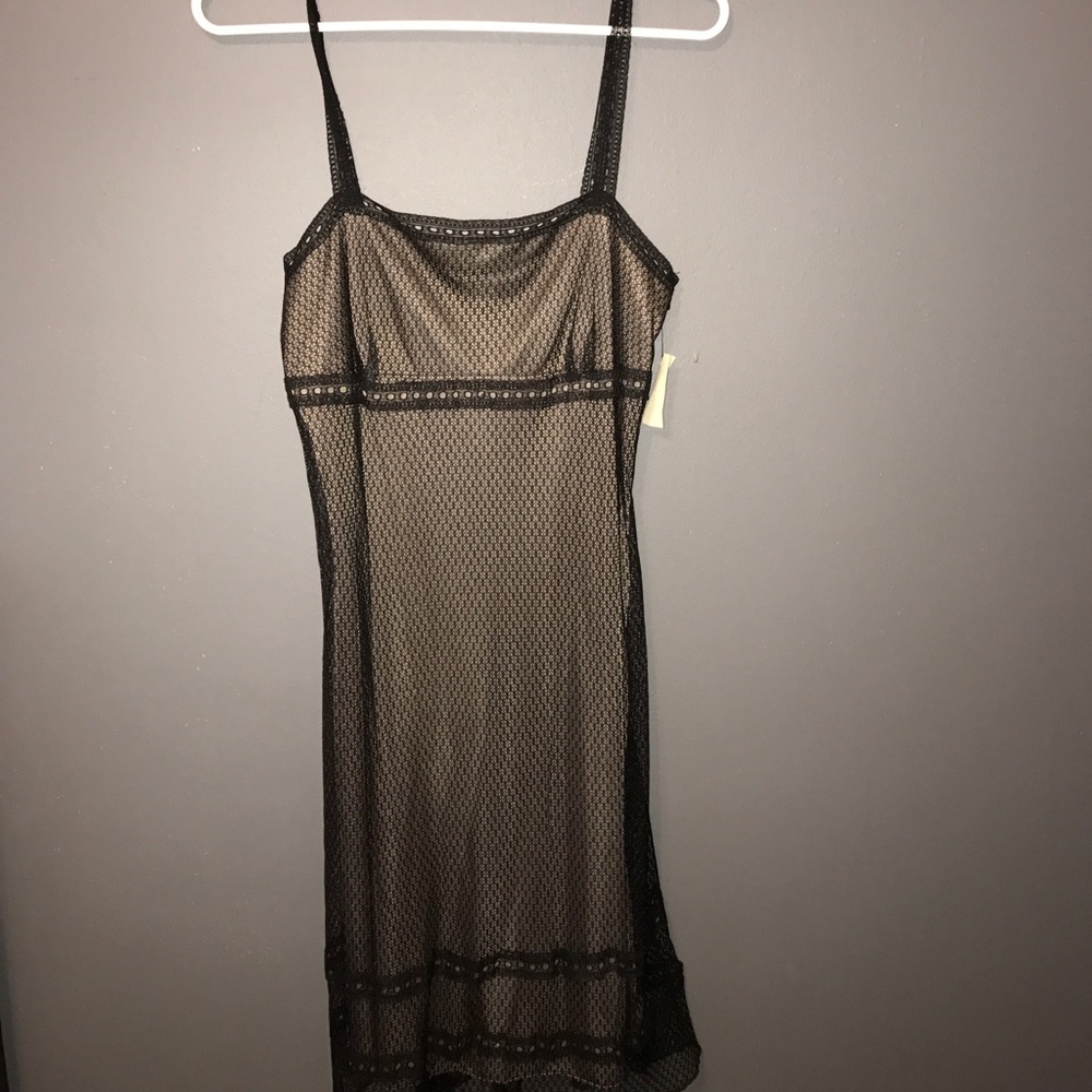 Flirty /sexy / black with nude under lay dress