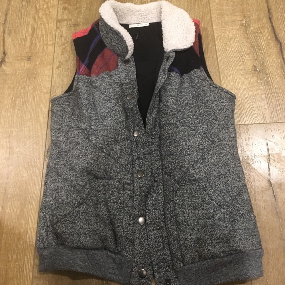 Gray vest with fir trim
