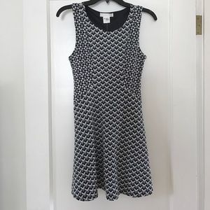 Never worn dress, beautifully fitted.