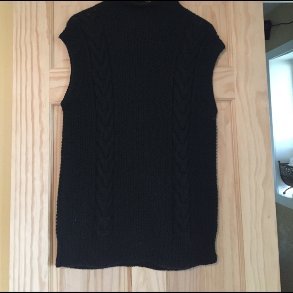 Dark green sweater vest