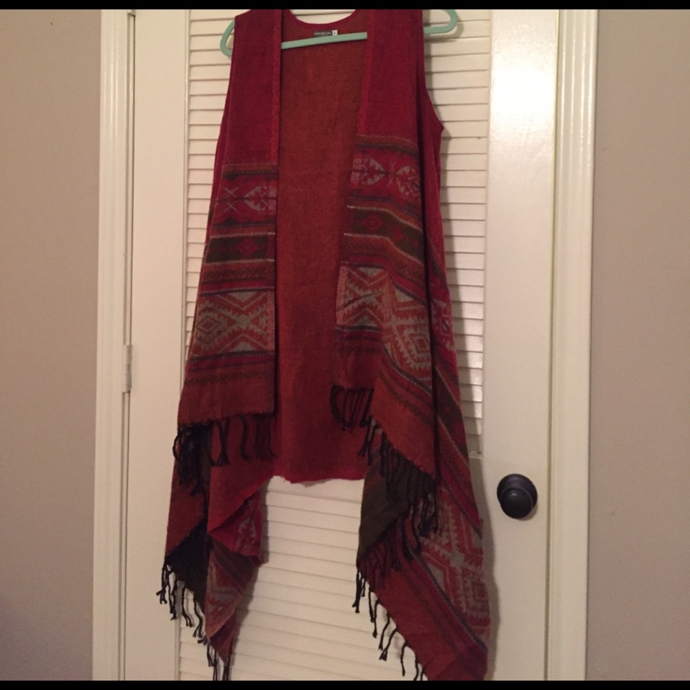 Tribal vest, never worn but the tag fell off.