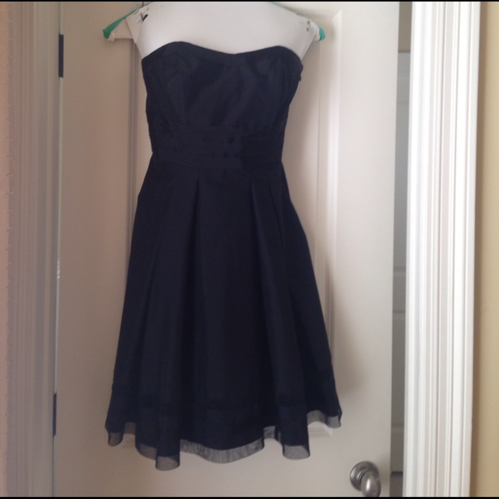 White House / Black Market Eloquent black dress.