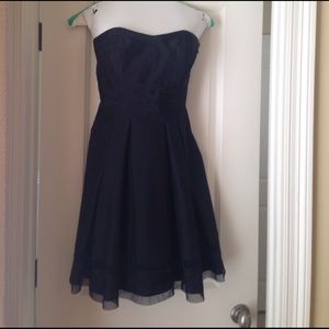 White House / Black Market Eloquent black dress.