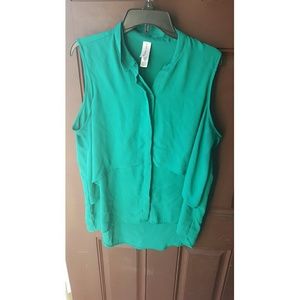 Green button up ruffled blouse.
