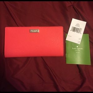 'NWT Kate Spade Stacy wallet, pinky / coral color.