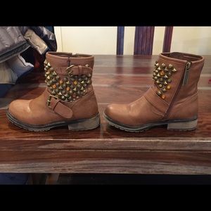 Cute booties blinded out with gold gems.