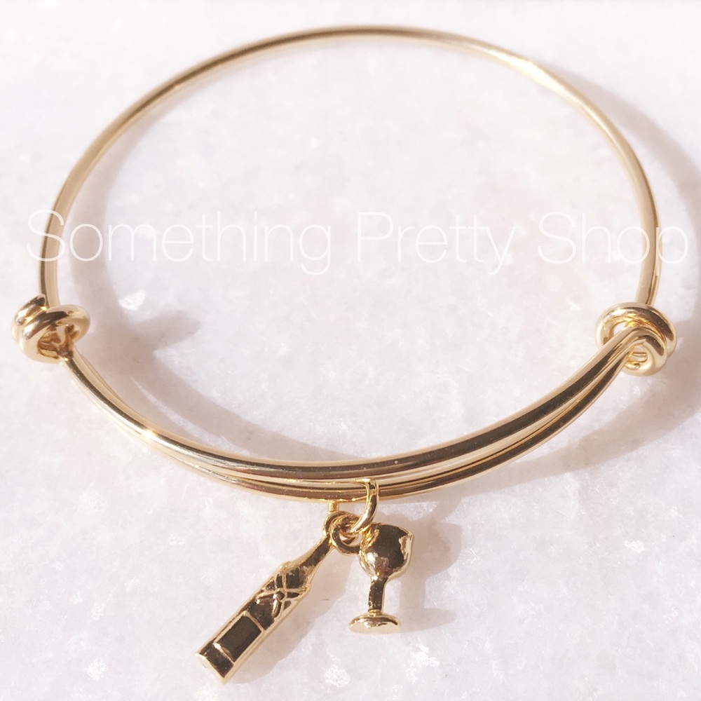 $180 ANTHROPOLOGIE GOLD WINE CHAMPAGNE BRACELET
